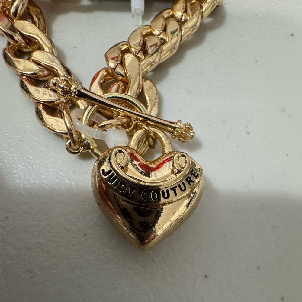 Juicy Couture toggle bracelet sold at Urban Outfitters